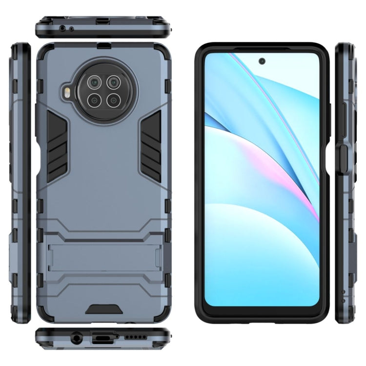 Navy blue shockproof phone case with triple-camera ring and reinforced corners