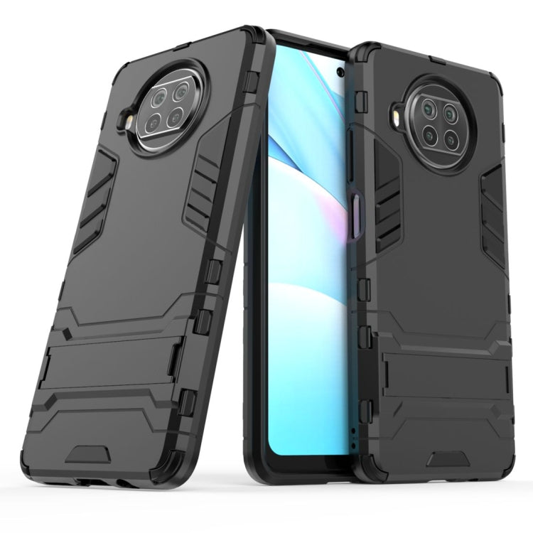 Navy blue rugged protective phone case with camera opening and shock-absorbing frame