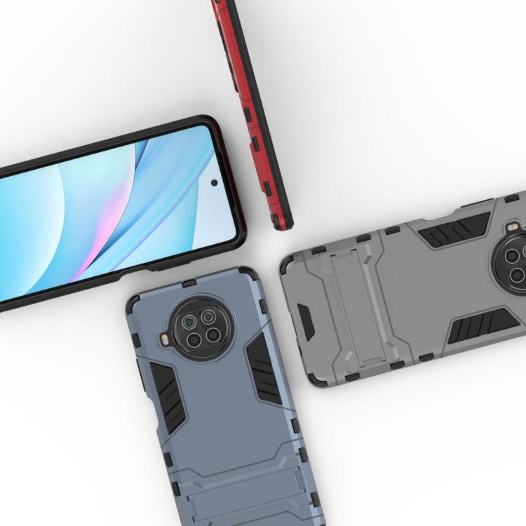 Gray/black rugged phone case with camera cutout and grippy side panels