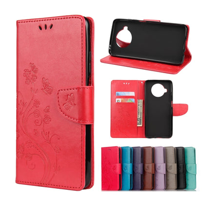 Red embossed leather flip wallet phone case with butterfly and flower pattern