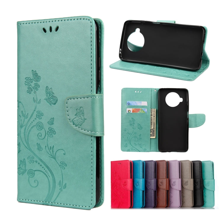 Embossed butterfly-and-flower flip leather wallet case with card slots, mint green color