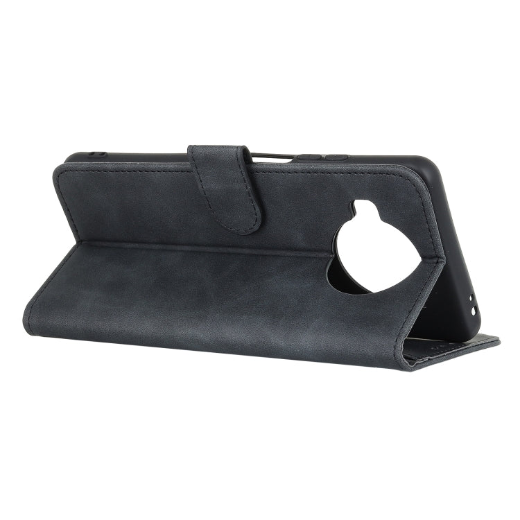 Black folio flip phone case with viewing stand and cutout camera area