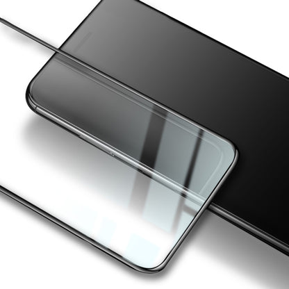 Tempered glass screen protector showing slim edge coverage over smartphone corner