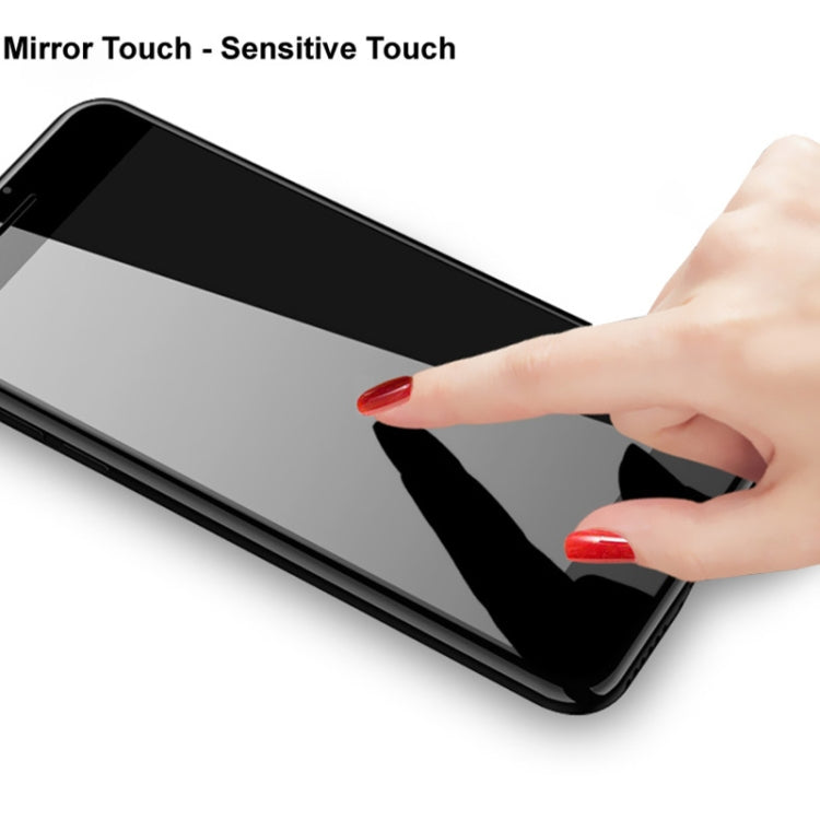 Tempered glass screen protector on phone screen with finger swipe