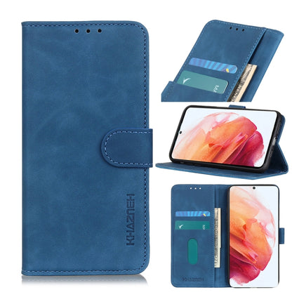 Blue PU/TPU flip phone wallet case with card slots, phone shows pink flower wallpaper