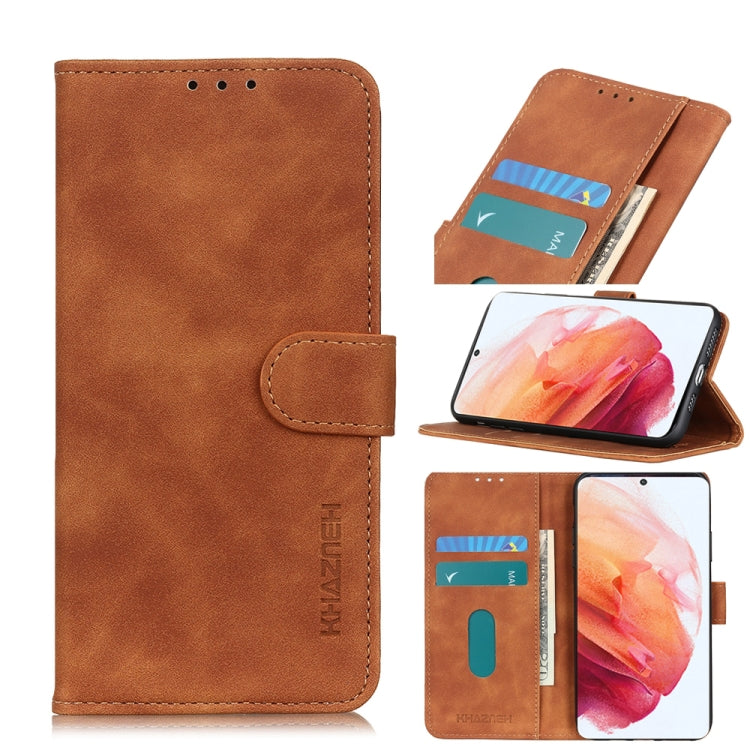 Brown PU/TPU flip phone wallet case with card slots, phone shows orange flower wallpaper