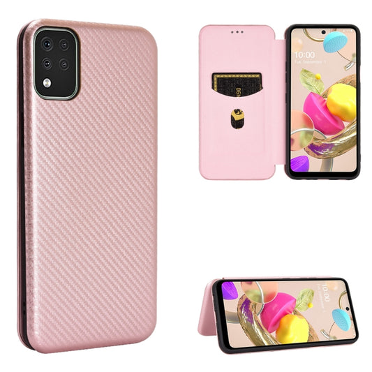 Pink carbon-fiber textured magnetic flip phone case with card slot, shown with phone
