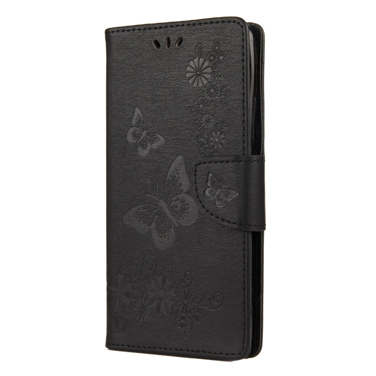 Black butterfly-embossed flip phone wallet with magnetic strap and card slots