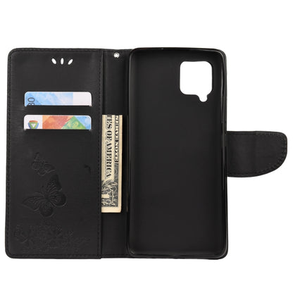 Black butterfly-embossed flip phone wallet showing card slot and stand cover