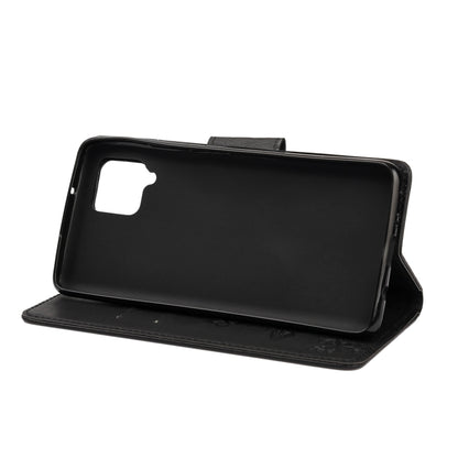 Black butterfly-embossed flip phone wallet with stand cover and camera cutout