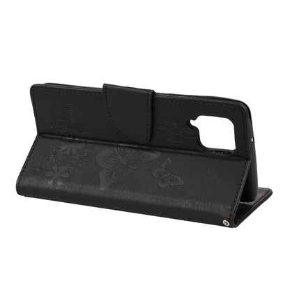 Black butterfly-embossed flip phone wallet with front window and stand