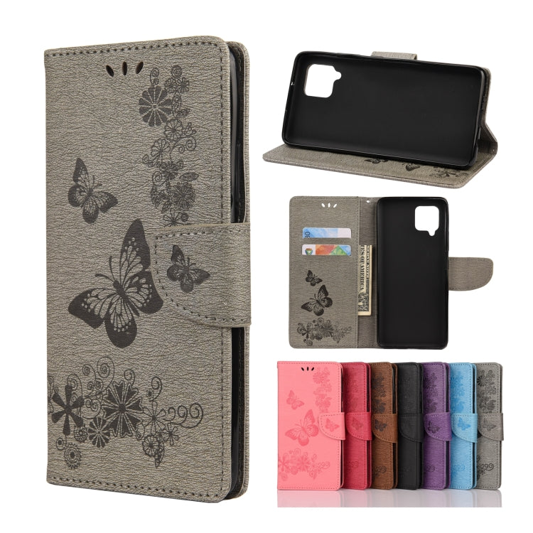 Grey butterfly-embossed flip phone wallet with card slots and camera cutout