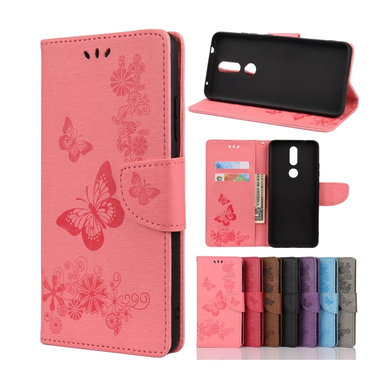 Pink butterfly embossing flip leather phone case with card slots and holder