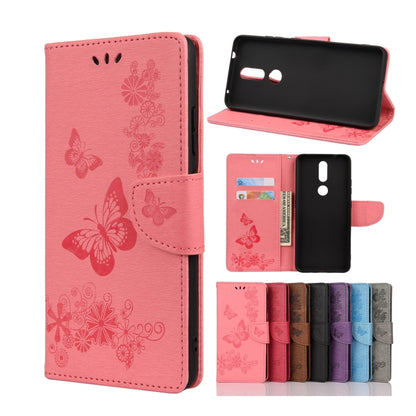Pink butterfly embossing flip leather phone case with card slots and holder