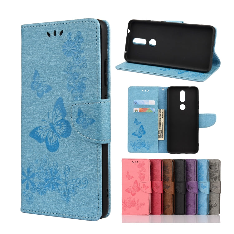 Blue butterfly embossing flip leather phone case with card slots and holder