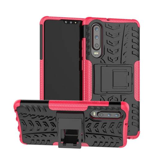 Pink and black tire-texture shockproof phone case with built-in holder