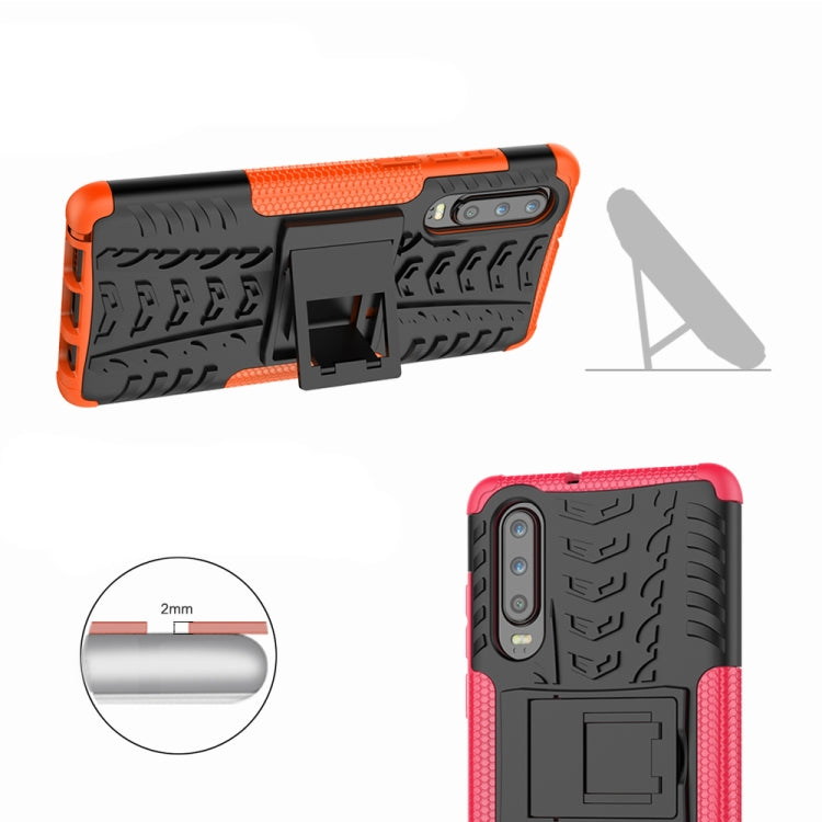 Orange and black tire-texture shockproof phone case with built-in holder