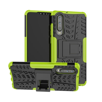 Green and black tire-texture shockproof phone case with built-in holder