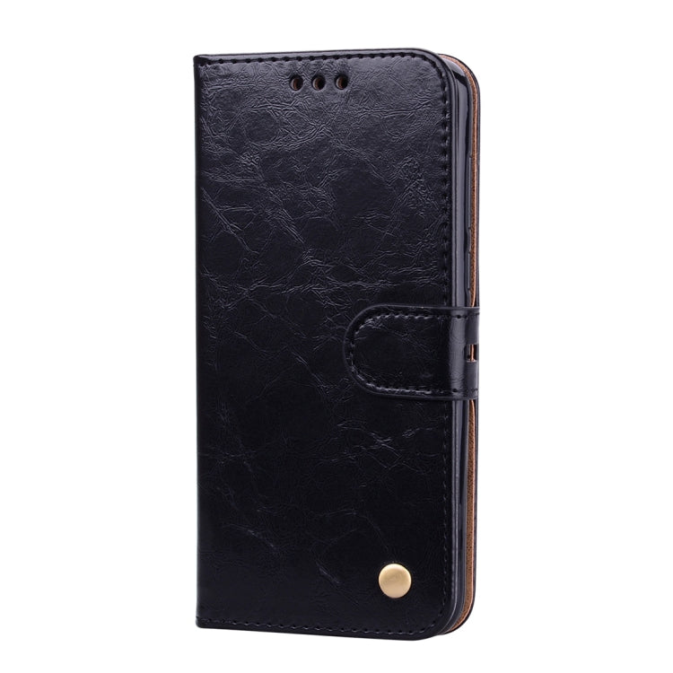 Black flip leather wallet phone case with button closure and built-in card holder