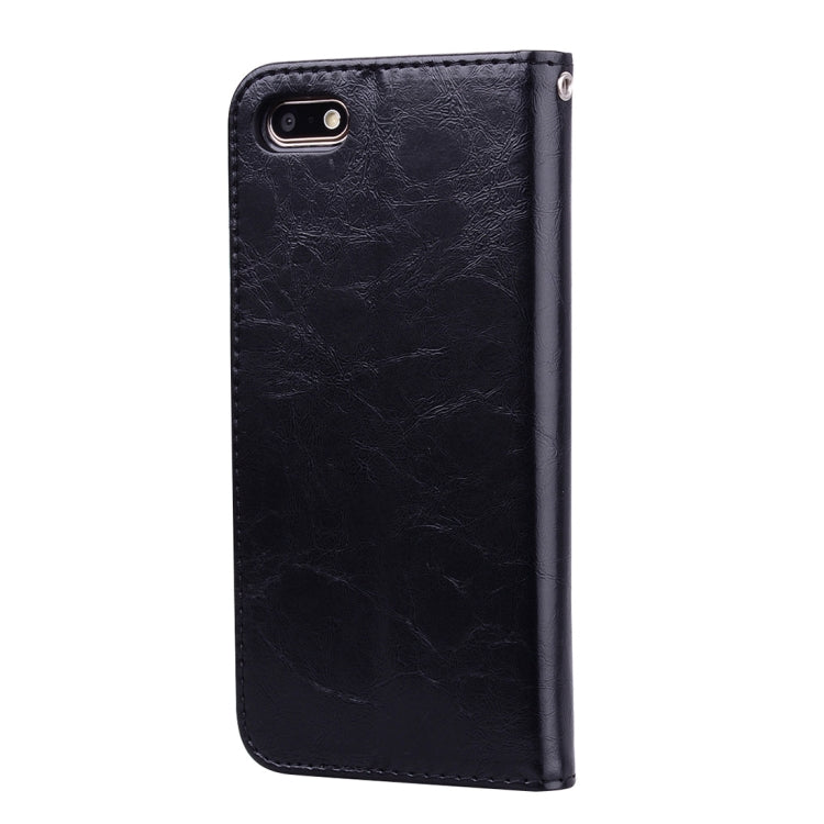 Black leather flip phone case with camera cutout and smooth back panel