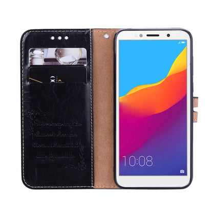 Black leather flip phone case with card slots and viewing pocket, with phone installed