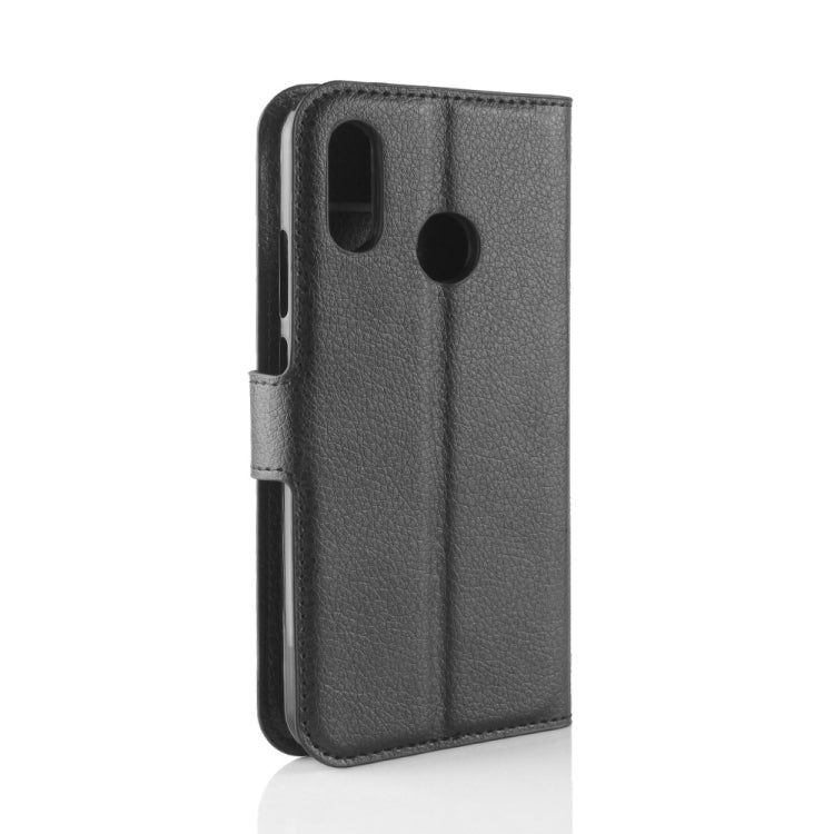 Black litchi-texture leather phone wallet case with camera cutout and side grip