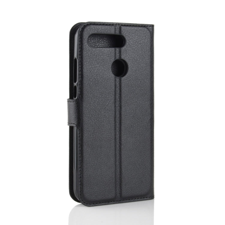 Black litchi-texture leather phone case with cutouts for camera and buttons