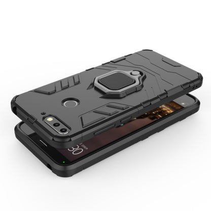 Black shockproof phone case with magnetic ring holder, top-down view