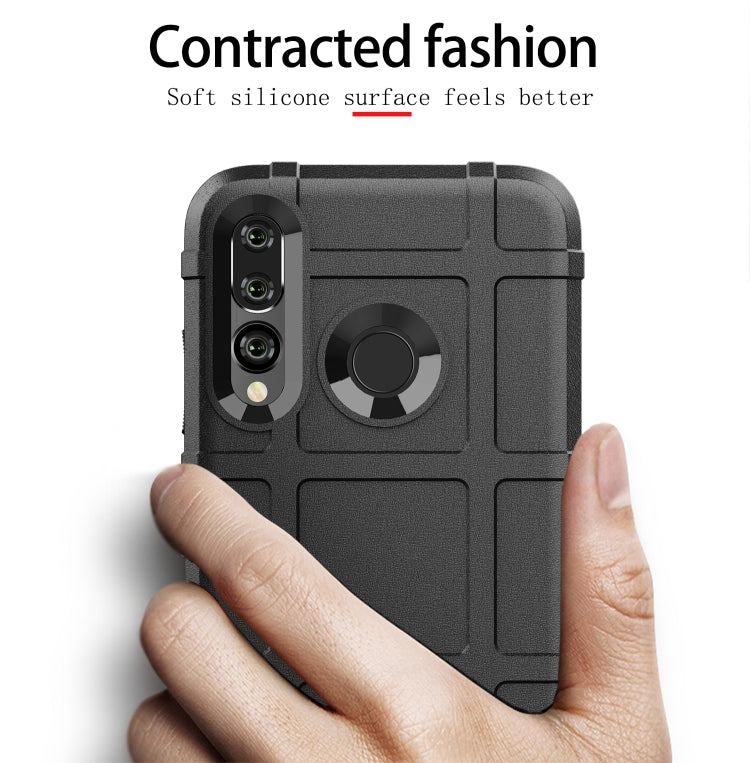 Black rugged silicone phone case with grippy texture and circular hand-strap ring