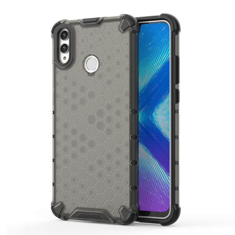 Grey honeycomb shockproof phone case with raised corners and camera cutout