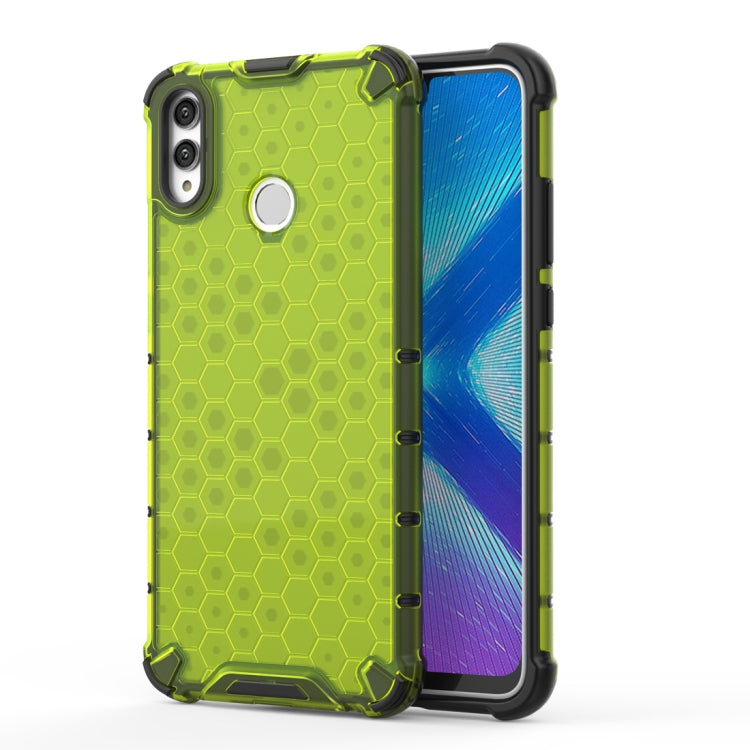 Green honeycomb shockproof phone case with raised corners and camera cutout