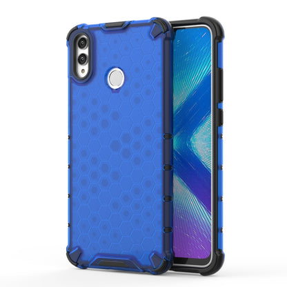 Blue honeycomb shockproof phone case with raised corners and camera cutout