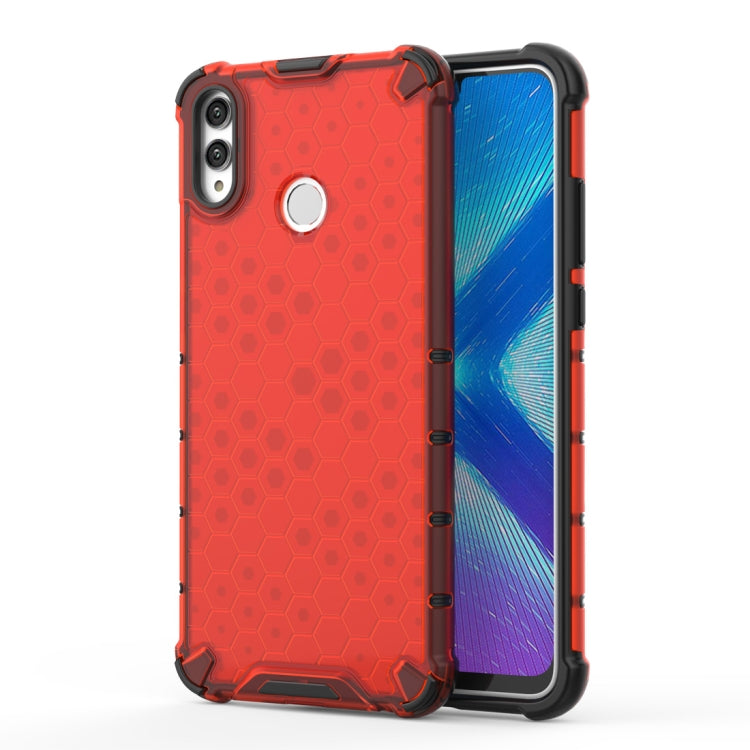 Red honeycomb shockproof phone case with raised corners and camera cutout