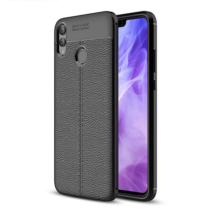 Black litchi-textured TPU shockproof phone case with raised camera ring for Honor 8X