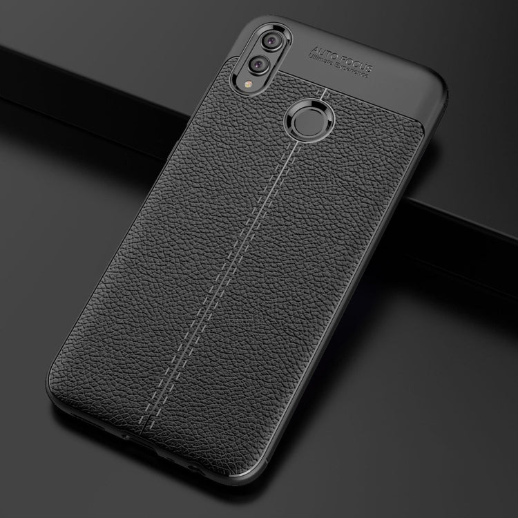 Black litchi-textured TPU phone case with circular grip and dual camera cutouts
