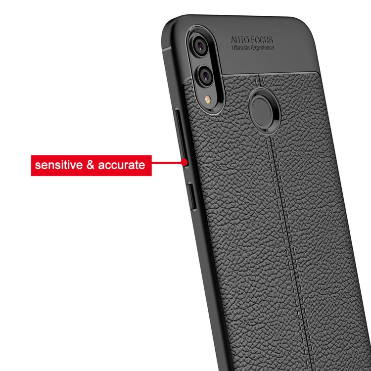 Black litchi-textured TPU phone case with precise cutouts and circular grip ring