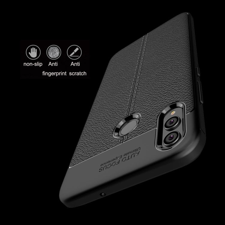 Black TPU phone case with litchi texture, raised corners, and dual camera cutouts