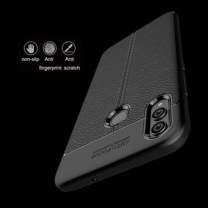 Black TPU phone case with litchi texture, raised corners, and dual camera cutouts