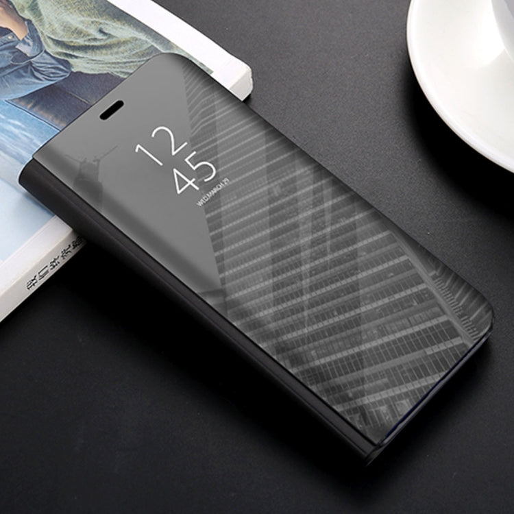 Dark gray mirror protective phone case with side port cutouts
