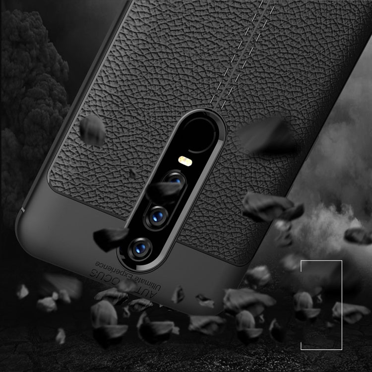 Black litchi-texture TPU case with triple-camera cover and textured grip