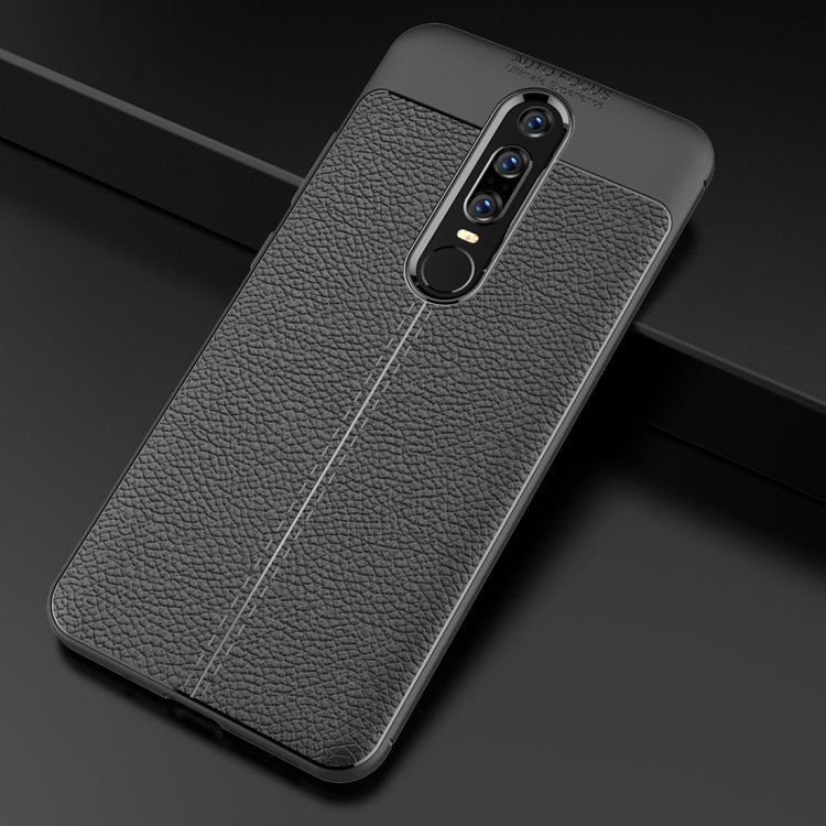 Black litchi-texture TPU case, slim profile with camera cutout