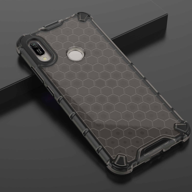 Black honeycomb shockproof phone case with camera and charging port openings.