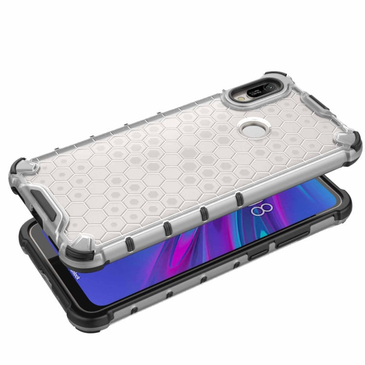 White honeycomb shockproof phone case with raised edges and ring holder.