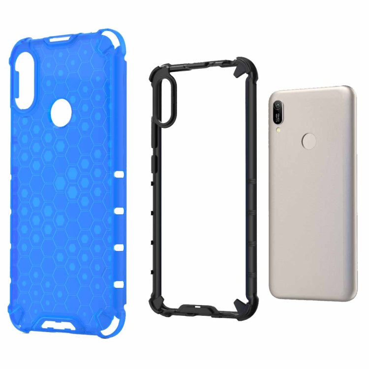 Blue honeycomb shockproof phone case with side buttons and camera cutout.