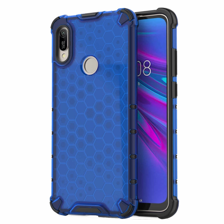 Shockproof honeycomb phone case in blue with raised edges and camera opening.