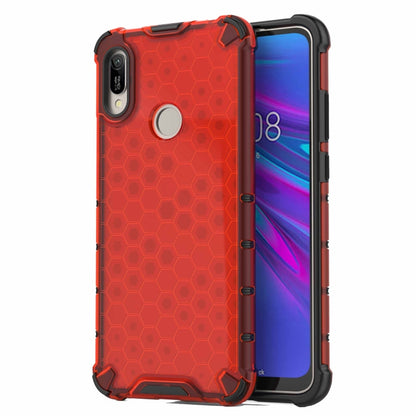 Shockproof honeycomb phone case in red with raised corners and camera cutout.