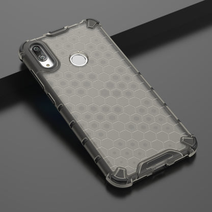 Honeycomb shockproof TPU phone case, light gray hex pattern, side-angle close-up