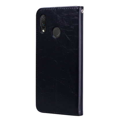 Dark blue flip leather phone case with cutouts and magnetic snap