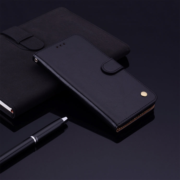 Black leather flip phone wallet with snap strap and side card holder
