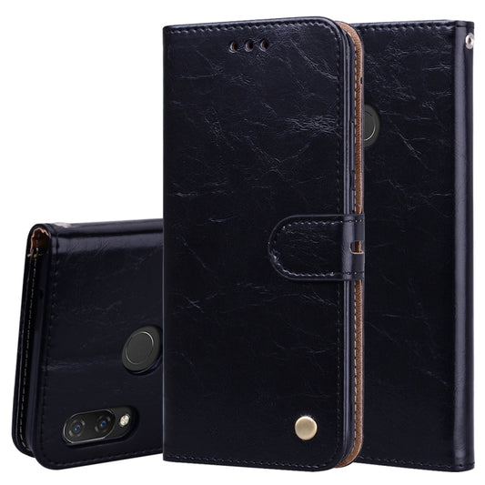 Black leather-look flip wallet phone case with magnetic closure and card slots